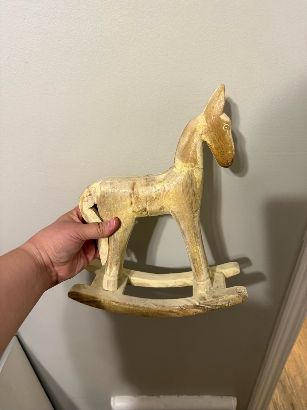 Hand-Carved Cream Wooden Rocking Donkey - Decorative Home Accent.